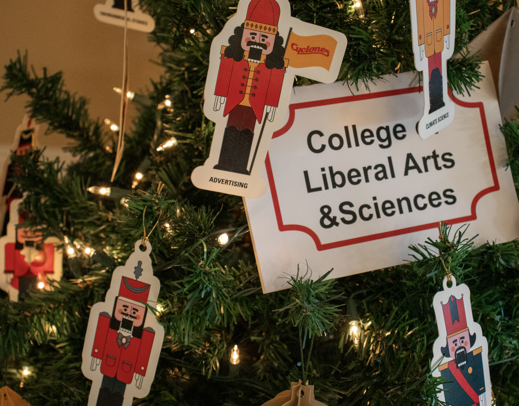 Close-up of the College of Liberal Arts and Sciences tree decorated with nutcrackers featuring LAS majors on them.